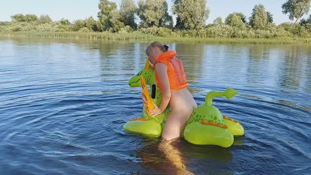 Alla hotly fucks a rare inflatable dragon on the lake and wears an inflatable vest!!! — MILF & Mature scene by Mylfed